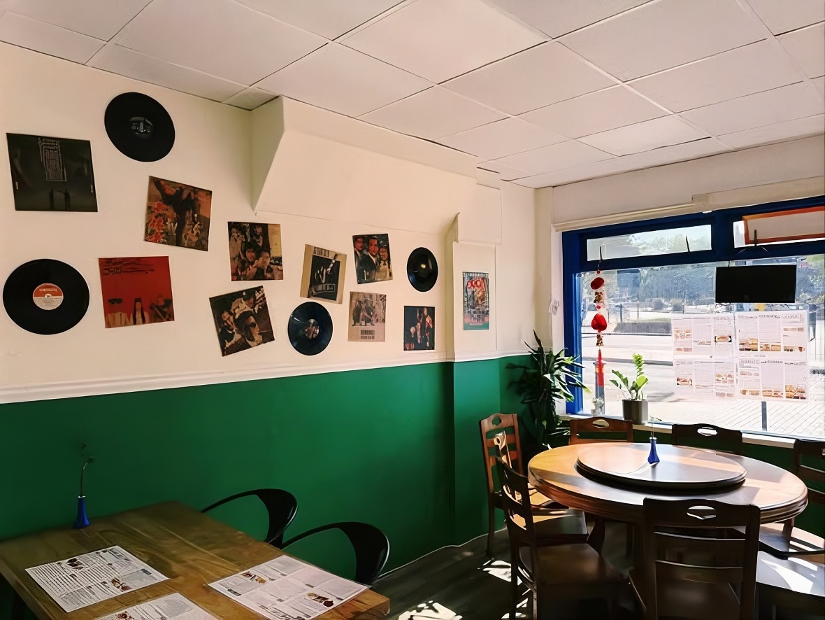 Inside Bamboo Garden restaurant with vinyl records on the wall